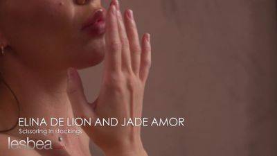 Jade - Petite French Brunette Jade Amor & Elina De Lion scissor in fishnets and lingerie in hot lesbian action - sexu.com - Ukraine - France