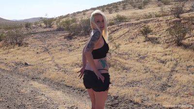 Lucy Cat gets wild and sucks her boyfriend's hard cock in the middle of the desert - sexu.com